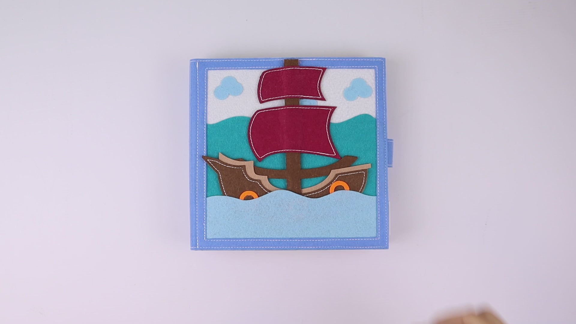 a wall mounted picture of a pirate ship